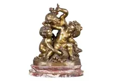 Trois Putti jouant avec un panier de fleurs by Raphaël Charles Peyre, Epreuve en bronze à patine médaille sur un socle en marbre rouge veiné, sold Nov 2014