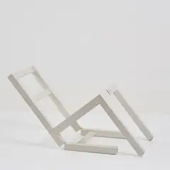 Stuhl 'der erste sitzende stuhl (nach langem stehen sich zur ruhe setzend)' by Timm Ulrichs, 1970, Holz, weiß lackiert, Scharnier (Timm Ulrichs), sold Oct 2026