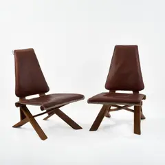 Zwei Klappsessel 'Dromadaire' - 'S 46' by Pierre Chapo, 1979, Ulmenholz, dunkelbraunes Leder, Leinstoff (Chapo Gordes SA, Gordes), sold Oct 2026