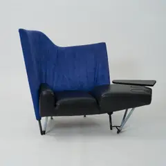Sessel mit Fußstütze 'Torso' by Paolo Deganello, 1982, Metallrohr, hellblau und dunkelgrau lackiert, blauer Textilbezug, schwarzes Leder, Holz, schwarz lackiert (Cassina, Mail, sold Oct 2026
