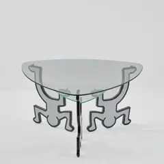 Sofatisch by Keith Haring, 1990, Glas, Metall, Holz, weiß und schwarz lackiert (Bretz, Gensingen (zugeschrieben)), sold Oct 2026