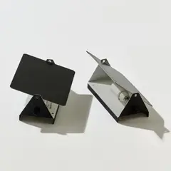 Zwei Wandappliken 'CP-1' by Charlotte Perriand, 1963, Metallblech, schwarz und weiß lackiert (Steph Simon, Paris (ursprünglich); SCE, Frankreich), sold Jun 2026