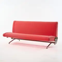 Sofa / Bett 'D 70' by Osvaldo Borsani, 1954, Metallrohr, Metallblech, vernickelt, Messingblech, roter Textilstoff (Tecno, Mailand), sold Jun 2026
