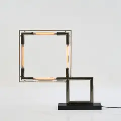 Tischleuchte 'Quadro' by Jacques Adnet, 1929, Metallrohr, vernickelt, Leuchtstoffröhren, schwarzer Marmor, Metallblech (Frankreich, wohl 1970- 1980er Jahre), sold Mar 2026