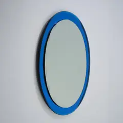 Wandspiegel by Pietro Chiesa, um 1958, Fontana Arte, Mailand Spiegelglas, geschliffen, blaues Glas (76 x 57 cm), sold Mar 2026