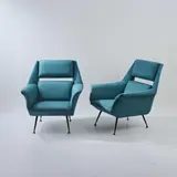 Zwei Sessel by Gigi Radice, um 1960, Metallrohr, schwarz lackiert, Messingrohr, petrolfarbener Textilbezug (Minotti, Meda), sold Dec 2025