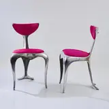 Zwei Stühle 'Dolphin chair' by Mark Brazier-Jones, 1990, Aluminiumguss, rosaroter Bezugstoff (Mark Brazier-Jones, Buckland, Buntingford, 2008), sold Dec 2025