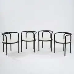 Vier Armlehnstühle 'Locus Solus' by Gae Aulenti, 1964, SMetallrohr, schwarz lackiert, weißer Kunststoff (Poltronova, Pistoia), sold Oct 2025