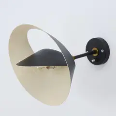 Wandapplique 'Petite Saturne' by Serge Mouille, 1957, Messingblech, Messingrohr, schwarz lackiert, Aluminiumblech, schwarz und weiß lackiert (Steph Simon, Paris), sold Jul 2025