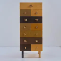Kommode 'Genesio' by Alik Cavaliere, 1990, Holzkastenkonstrukton, Wurzelholzfurnier, verschiedenfarbig lackiert, Bronzeguss, Darstellung von Szenen aus der Genesis, sold Jul 2025