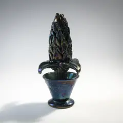 'Pianta grassa' by Murano, um 1935, (Stark blasiges dunkelgrünes Glas, irisiert), sold Oct 2024