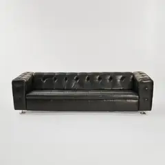 'James Bond' Dreiersofa 'RH 306' by Robert Haussmann, um 1962, Holzrahmenkonstruktion, schwarzes Leder, Metallfüße (DeSede, Klingnau), sold Jun 2024