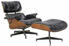 EAMES BLACK LEATHER LOUNGE CHAIR & OTTOMAN by Herman Miller, 1978, padded leather back and seat, sold Oct 2025