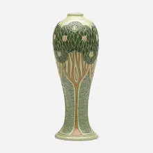 Della Robbia vase with stylized tulip poplars by Frederick Hurten Rhead, 1906-07, glazed and carved earthenware, sold Nov 2023