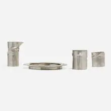 Pinch sugar and creamer set by Michael Jerry, c. 2007, pewter, sold Jan 2022
