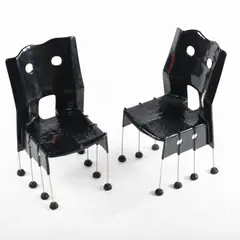Zwei Stühle 'Greene Street Chair' by Gaetano Pesce, 1984, Stahlstäbe, verchromt, schwarzes Kunstharz (Vitra Design, Weil am Rhein), sold Dec 2021