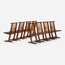 Conoid dining chairs, set of eight by George Nakashima, 1975-78, American black walnut, hickory, sold Dec 2021