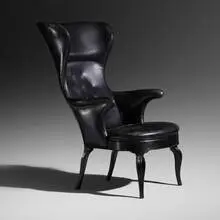 Wingback chair by Frits Henningsen, 1935, leather, lacquered oak, sold Dec 2021