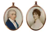 A fine pair of portrait miniatures of a husband and wife by Charles Robertson, Watercolour on ivory In matching gold frames Oval, offered Mar 2018