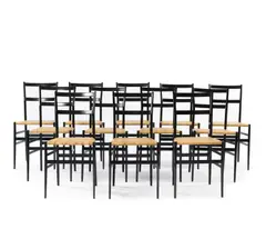 Zwölf Stühle 'Superleggera' by Gio Ponti, 1957, Holz, schwarz lackiert, Geflecht (Cassina, Mailand), sold Feb 2020