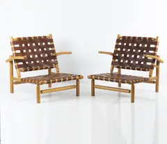 Zwei Sessel 'Rauma Repola' by Ilmari Tapiovaara, um 1955, Buchenrundholz, Buchenholz, braunes Ledergeflecht (Finnland), sold Oct 2018