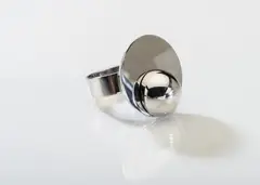 Kinetischer Ring by Friedrich Becker, 1971, Kreisförmig bewegt sich die kleine Halbkugel auf der ebenen Fläche ihres Pendants (Zwei Halbkugeln bilden das bewegliche, sold Dec 2017