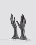 Solitaire/Solitary (Les mains libres) by Man Ray, 1971, Bronze à patine brune, sold Mar 2021
