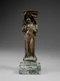 Supporto in bronzo in forma di figura femminile avvolta da ghirlanda d'alloro by Nello stile di Leonardo Bistolfi, sculpture, sold Oct 2026