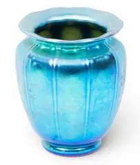 Blue Aurene Glass Vase by Alexander Joseph von Steuben, Blue iridescent glass with a lobed panel body pinched rim and a flared lip, sold Oct 2026