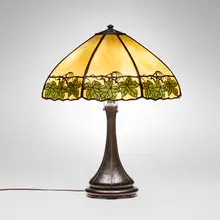 Teroca overlay table lamp with ivy leaves by Handel, c. 1910, patinated metal, leaded and painted slag glass, sold Oct 2026