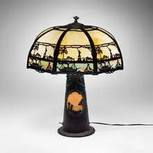 Manhattan Skyline table lamp by Edward Miller & Co., c. 1920, patinated metal, slag glass, sold Oct 2026