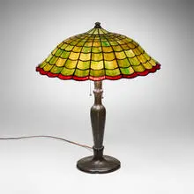 Table lamp by Handel, c. 1910, leaded glass, patinated metal, sold Oct 2026