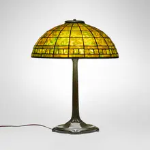 Colonial table lamp by Tiffany Studios, c. 1910, leaded glass, patinated bronze, sold Oct 2026