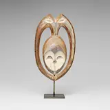 Rare and Exceptional dance mask by Kwele, c. 1900, carved wood, native trade paints, charring, pigment, offered Apr 2026