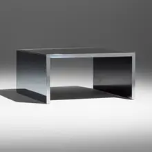 Coffee table by Nanda Vigo, 1971, mirrored glass, chrome-plated brass, sold Sep 2026