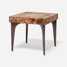 Game table, model 1410 by Aldo Tura, c. 1960, lacquered goatskin over wood, lacquered wood, brass, brass-plated aluminum, sold Sep 2026