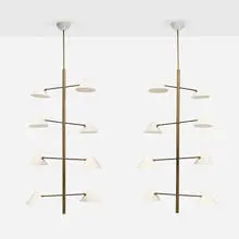 Eight-arm chandeliers, pair by Contemporary, c. 2013, brass, enameled aluminum, sold Sep 2026
