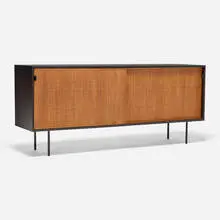 Cabinet by Florence Knoll, lacquered wood, oak, cane, leather, enameled steel, sold Sep 2026