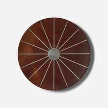 Charger by Phillip Lloyd Powell and Paul Evans, 1956-57, walnut, pewter, sold Sep 2026