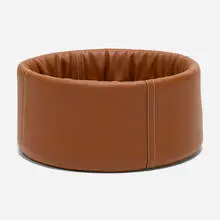 Patapouf medium dog bed by Hermès, c. 2020, leather, sold Sep 2026