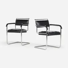 Armchairs, pair by Modern, chrome-plated steel, leather, lacquered wood, sold Sep 2026
