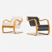 Cantilever lounge chairs, set of two by Alvar Aalto, birch, upholstery, painted plywood, sold Sep 2026