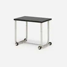 Occasional table, model 1558 by Warren McArthur, c. 1935, lacquered wood, aluminum, rubber, sold Sep 2026