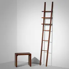 Wall shelf and occasional table from the Delano Hotel, Miami by Philippe Starck, c. 1995, mahogany, sold Sep 2026