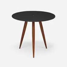 Occasional table by Phillip Lloyd Powell, c. 1975, slate, walnut, brass, sold Sep 2026