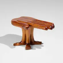 Hand-Foot occasional table by Pedro Friedeberg, 1977, laminated Mexican mahogany, sold Sep 2026