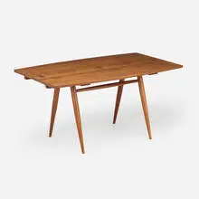Rare Boat-Shaped Turned-Leg extension dining table by George Nakashima, 1957, American black walnut, rosewood, sold Sep 2026