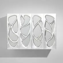 Wall-mounted cabinet by Phillip Lloyd Powell, c. 1965, silver leaf over carved wood, mirrored glass, sold Sep 2026