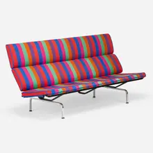 Compact sofa by Charles and Ray Eames, chrome-plated and enameled steel, Alexander Girard upholstery, sold Sep 2026