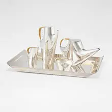 Como coffee and tea service by Lino Sabattini, c. 1956, silver-plated metal, cane, sold Sep 2026